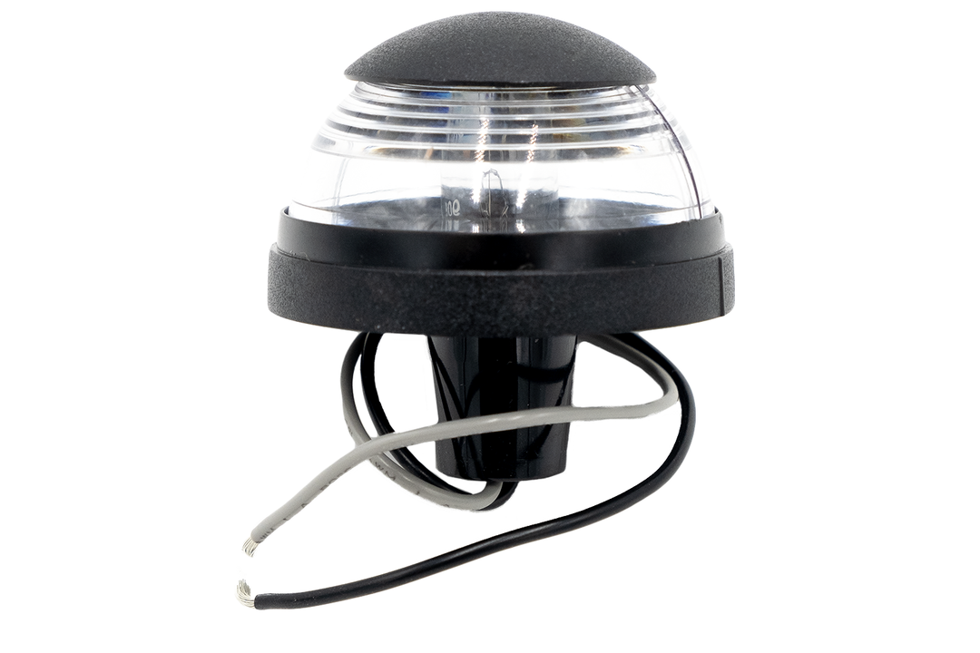 Tower anchor light with a black base, clear dome, and wiring, used for marking and signaling on towers.