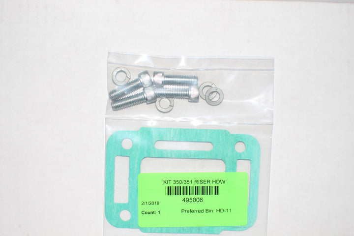 Metal screws, washers, and a green gasket in a clear plastic bag for riser hardware installation.