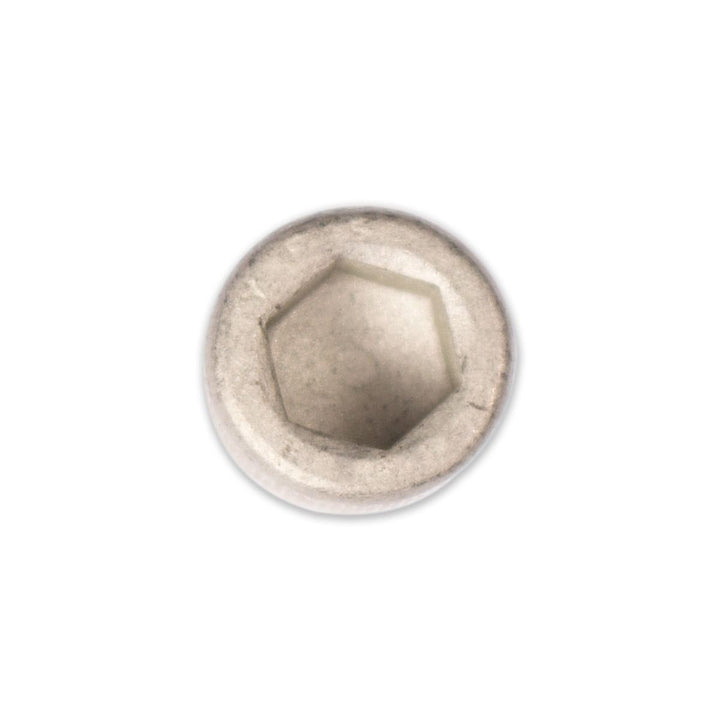 Close-up of a metal riser hardware kit with a hexagonal socket head, used for mounting or adjusting equipment.