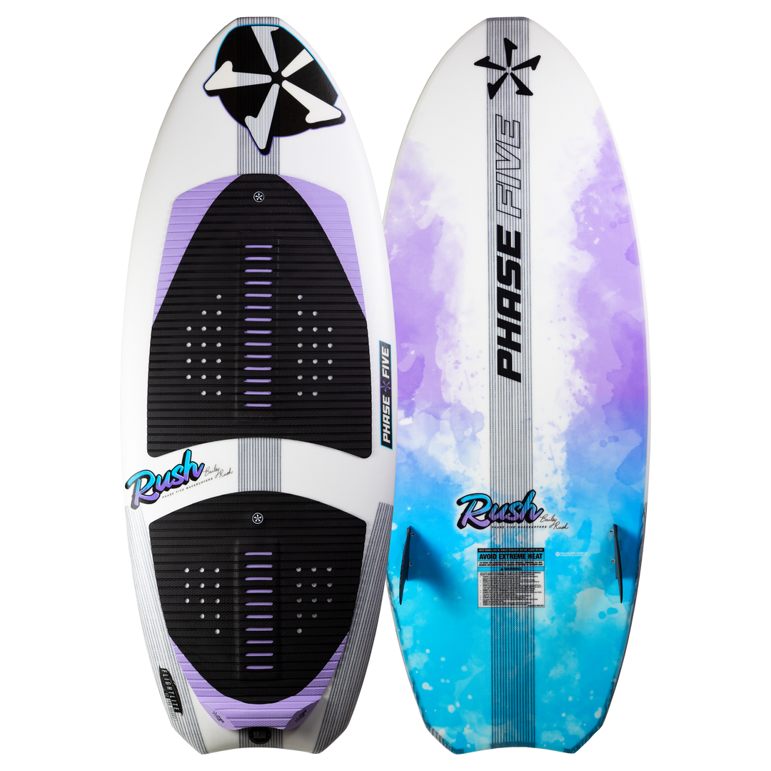 Front and back views of the 2025 Phase 5 Rush Surf Board with purple, black, and blue design, featuring traction pads and a leash.