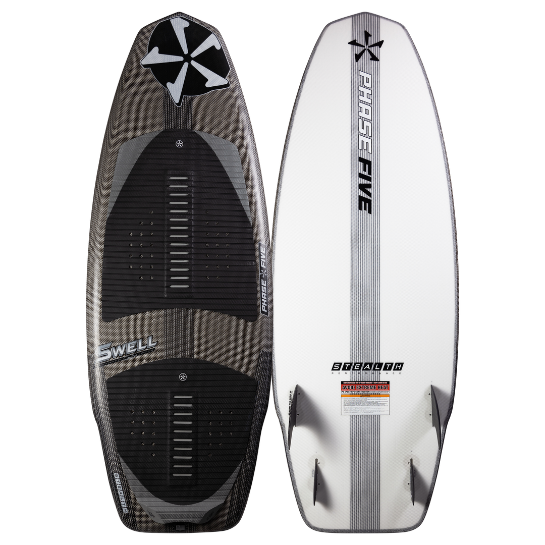 2025 Phase 5 Swell Stealth surfboard with black traction pads, white underside, and fin setup, designed for performance surfing.