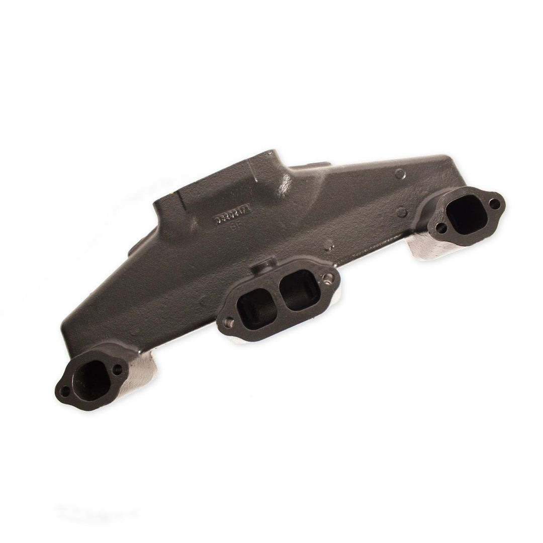 Center Riser Exhaust Manifold for engine, made of cast metal, with multiple ports for exhaust gases.