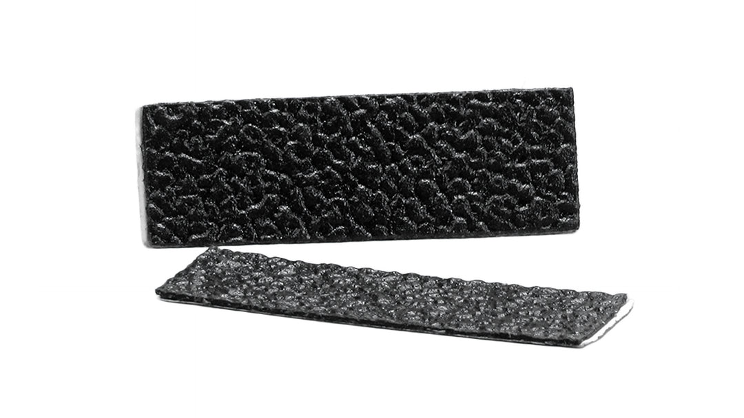 Non-skid cell phone holder pads designed to prevent slipping and secure devices in place during boating activities.