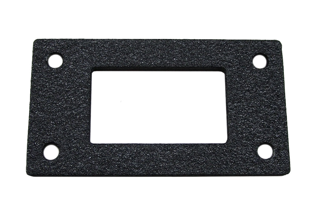 Black heater switch plate with four mounting holes and central rectangular opening for control access.