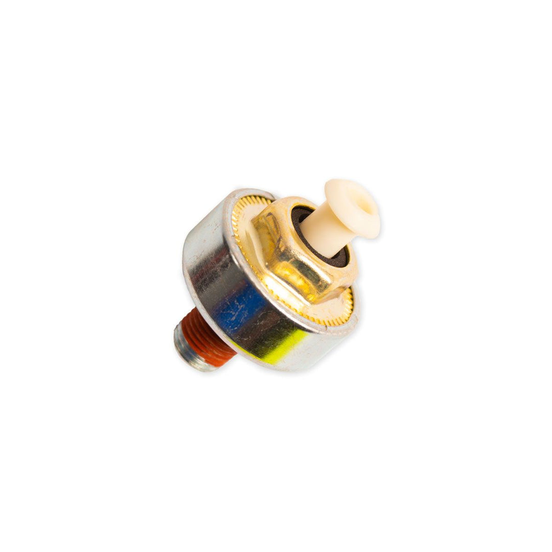 Indmar knock sensor with metal body and white plastic tip, used to detect engine knocking in marine engines.