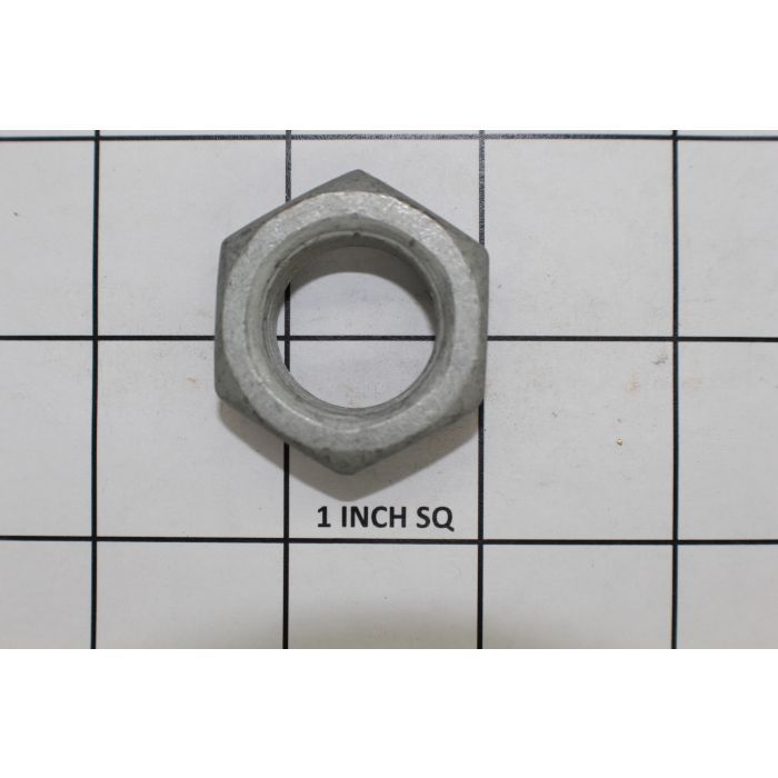 Indmar Jam Nut 7/8-14 SP, hexagonal steel lock nut for marine applications, shown on a 1-inch grid for size reference.