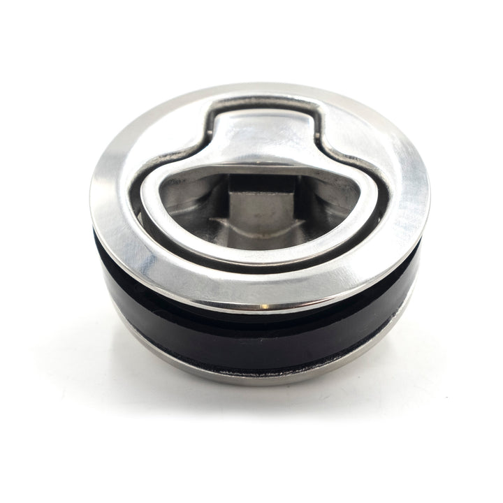 Wedge access door latch with metal and black components, designed for secure door closure and easy access.