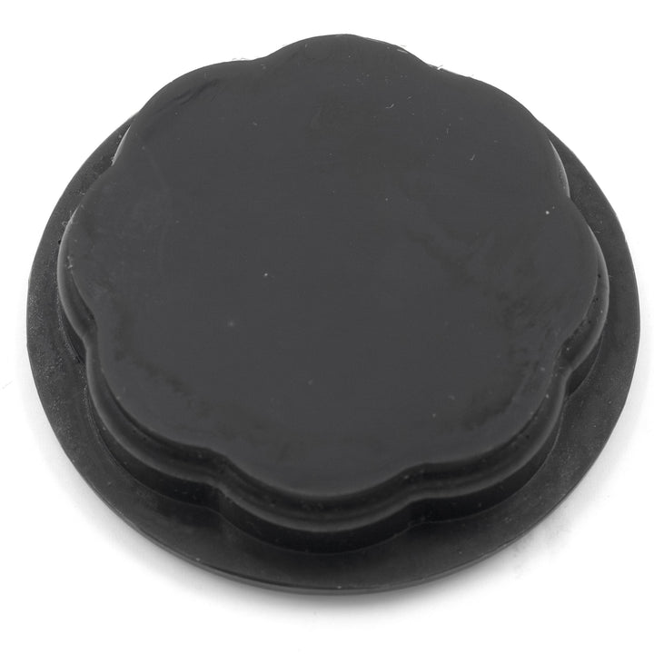 Black ski pylon floor cap, 13-15 size, with a rounded, slightly scalloped edge, designed to cover and protect ski pylon bases.