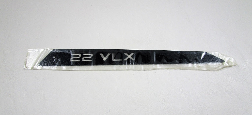 Black backlit port windshield model designator label for 2016-2018 VLX, with "22 VLX" text, on clear plastic backing.