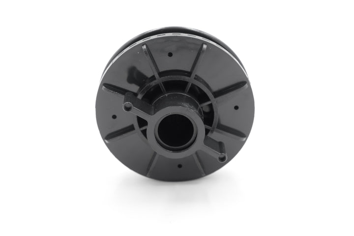 Black plastic cover vent with adjustable louver and central opening, designed for ventilation or air circulation.