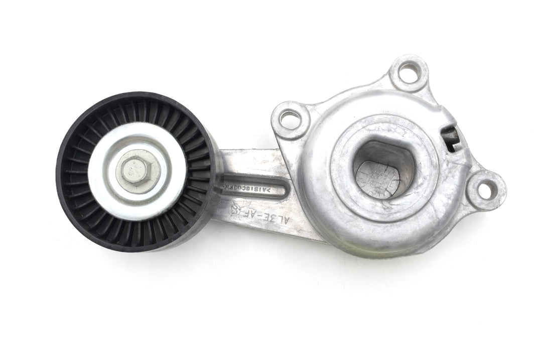 Indmar tensioner assembly for Ford 6.2 engine, featuring a metal bracket and a black pulley with a central bolt.
