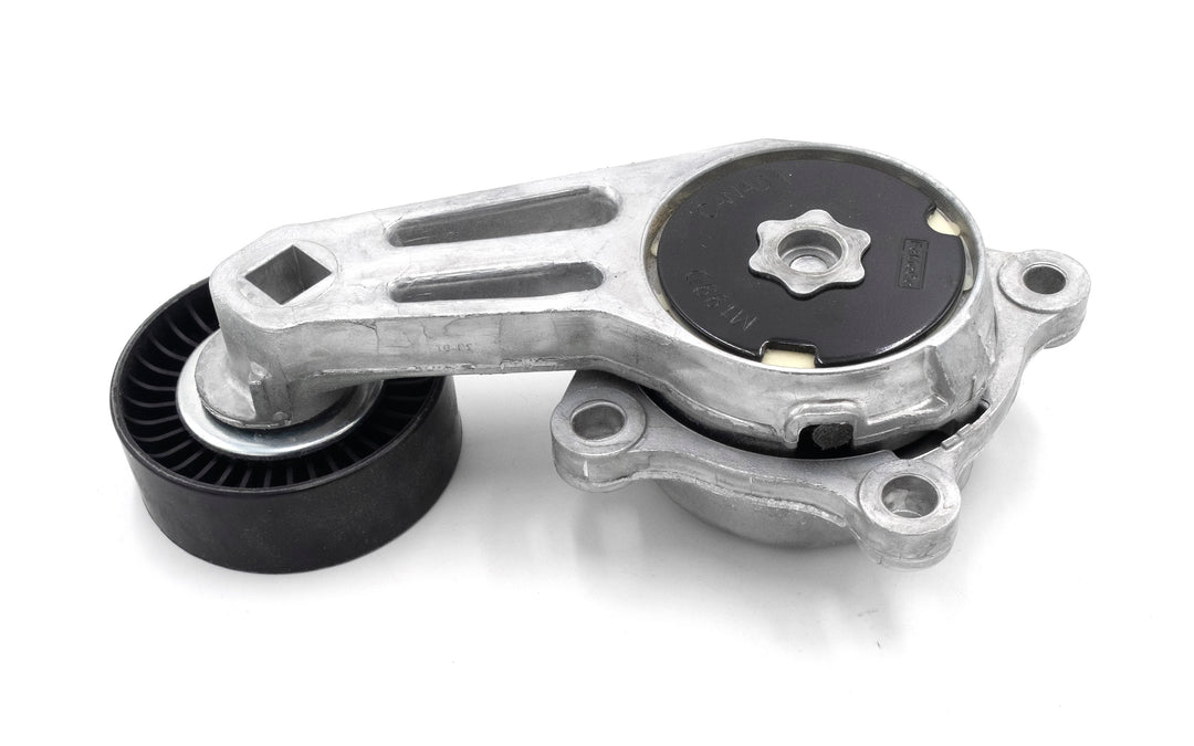 Indmar tensioner assembly for Ford 6.2 engine, featuring a metal bracket and a black pulley for belt tensioning.