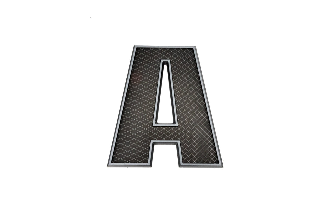 Black and silver decal emblem of the Axis SL24-A A/T Series with a diamond pattern, shaped like the letter "A".