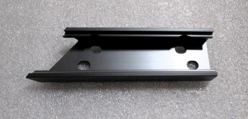 Black G10+ outside speaker mount with inside port, designed for secure outdoor audio installation.