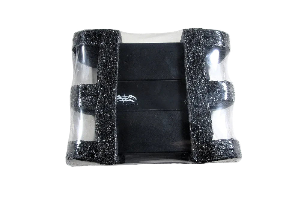 Black 2-channel 300x2 amplifier in protective packaging with foam padding, ready for installation or use.