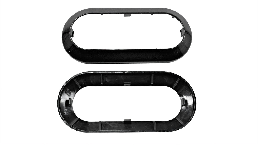 Malibu Trailer Light Oval Bezel in black, featuring a sleek oval design for secure light installation on trailers.