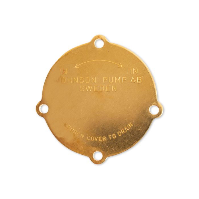 Gold-colored faceplate for Indmar Johnson raw water pump, with inlet/outlet arrows, "Johnson Pump AB Sweden" inscription, and drain cover note.