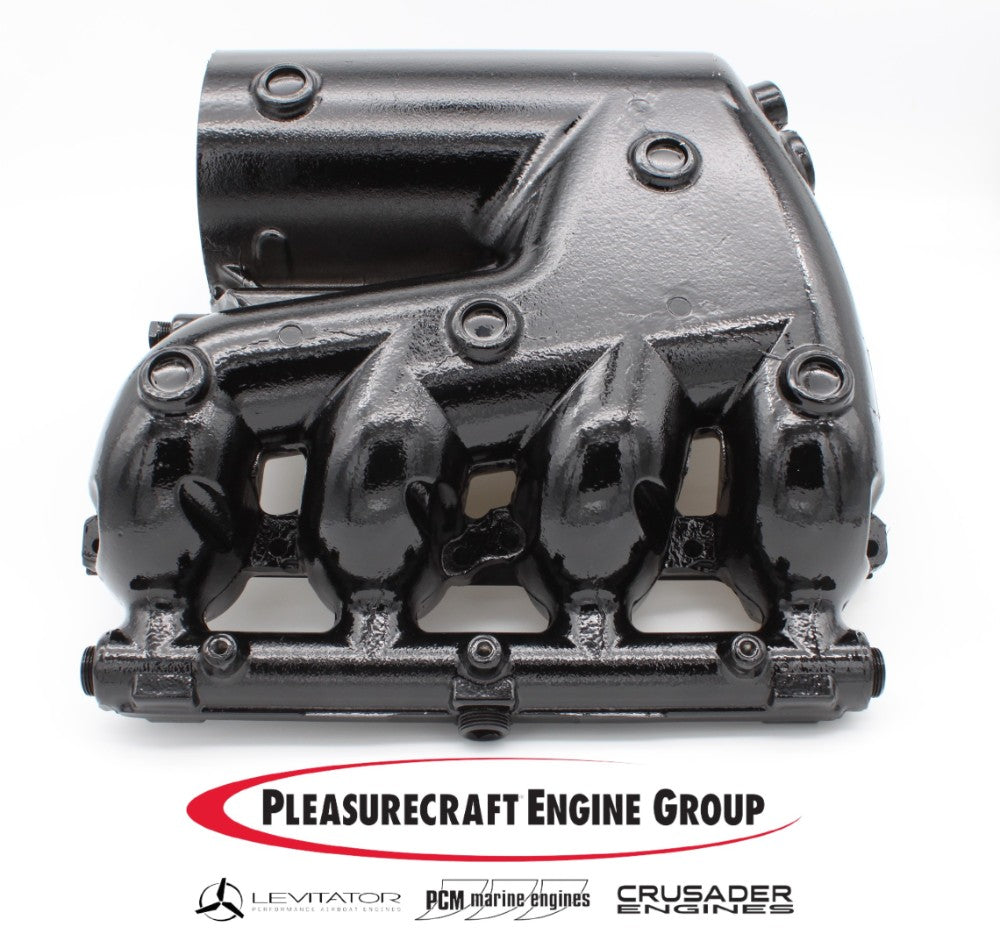 PCM 6.0L starboard exhaust manifold, black metal engine part with bolt holes, used in marine engines, by Pleasurecraft Engine Group.