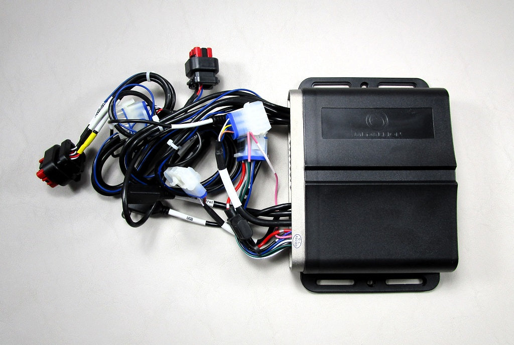 Black stereo Bluetooth CAN module with wiring harness and connectors, used for vehicle audio system integration.