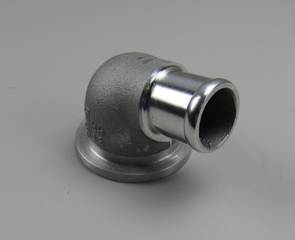 Machined exhaust thermostat cover for Gen V, featuring a metallic finish and precise machining.