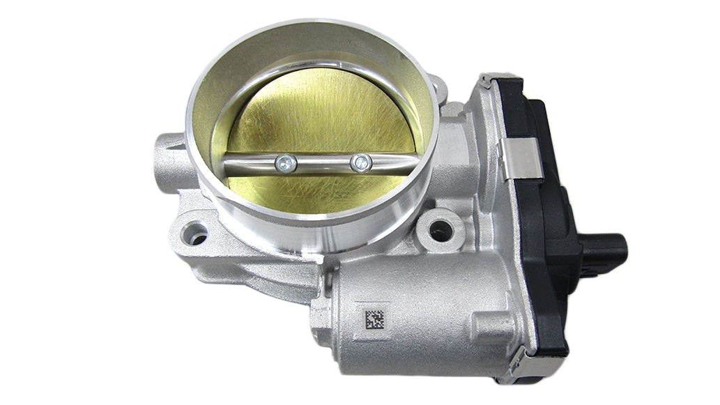 Throttle body assembly for M5 engine, 2019 model, featuring a metallic housing and throttle plate for engine airflow control.