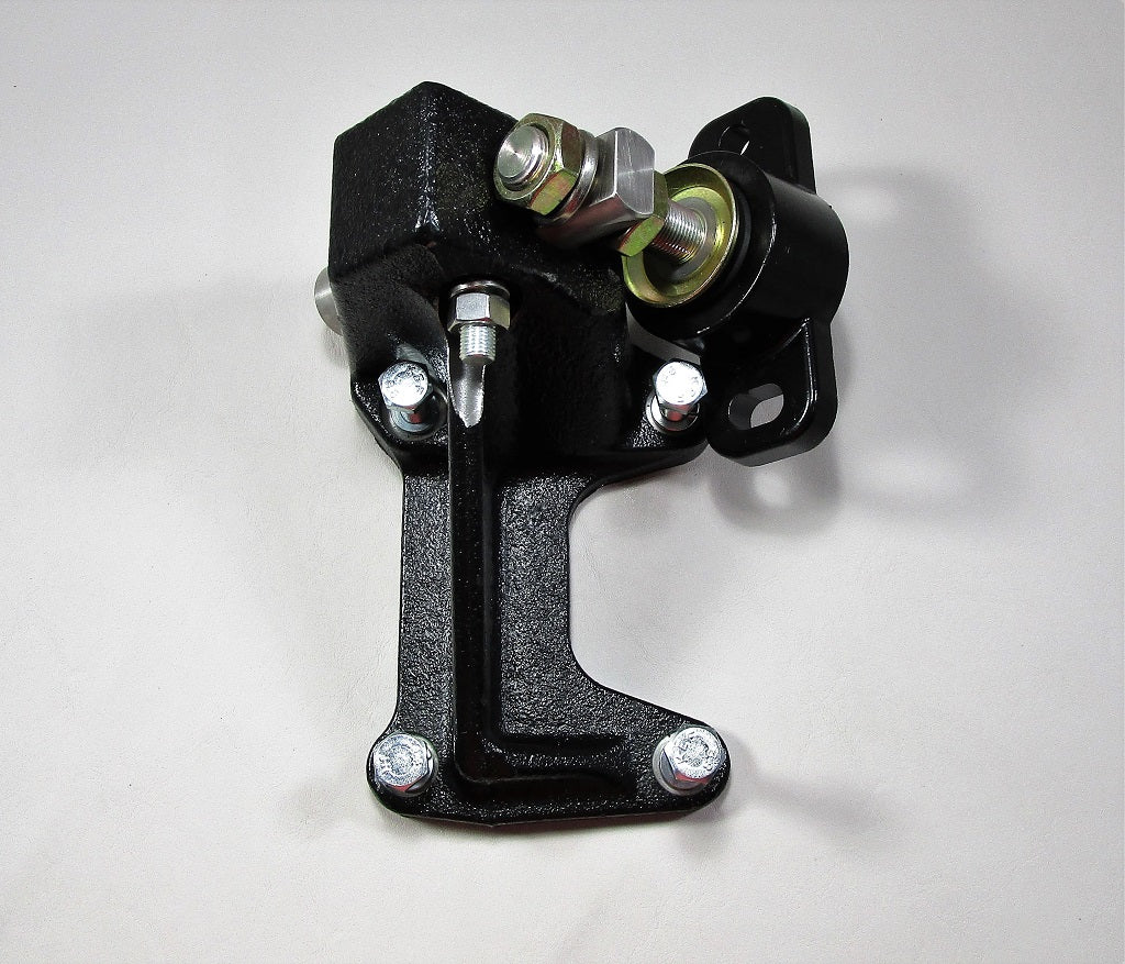 Front left side engine motor mount with black and metallic components, designed to secure the engine in place.