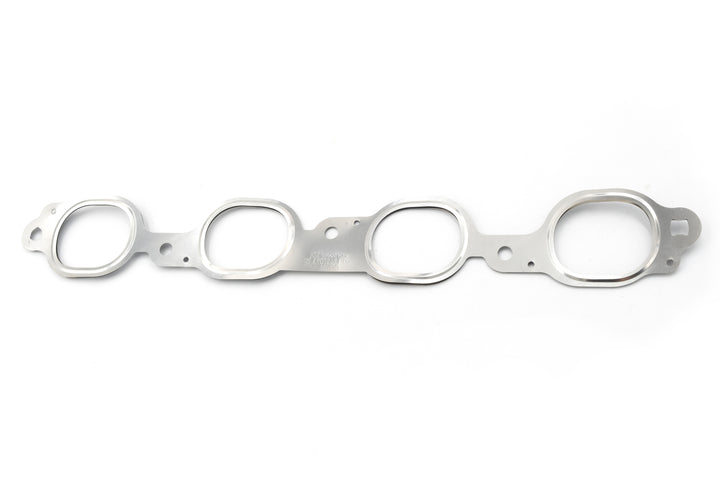 Exhaust head to manifold gasket in silver metal, designed to seal engine exhaust connections.