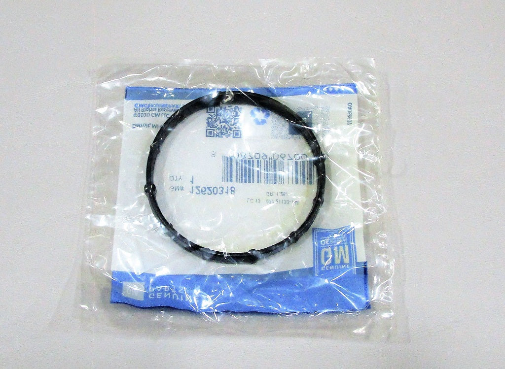 Seal for LT4 thermostat housing in sealed plastic packaging, designed to fit and prevent leaks in vehicle cooling systems.