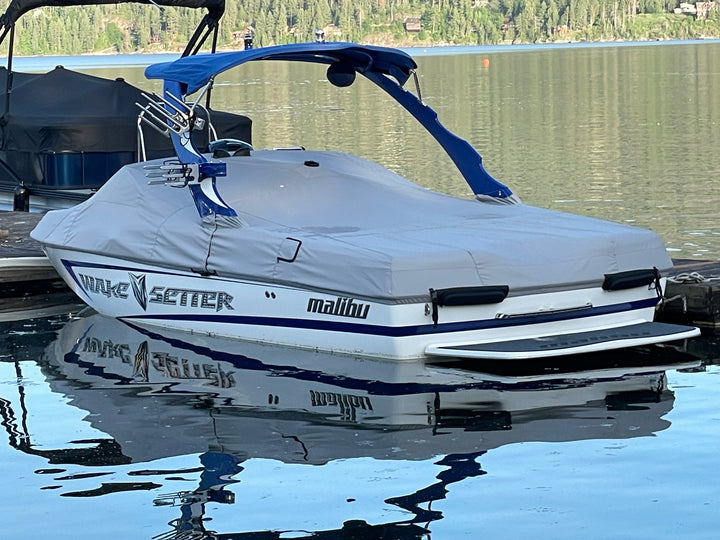 21ft Malibu boat cover for Illusion X/XS Tower, protecting the boat from weather and debris.