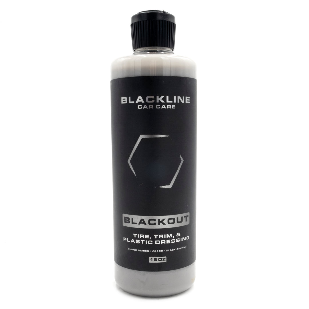 Blackline Blackout Tire, Trim &amp; Plastic Dressing in a 16 oz bottle, enhances vehicle appearance with a sleek black finish.