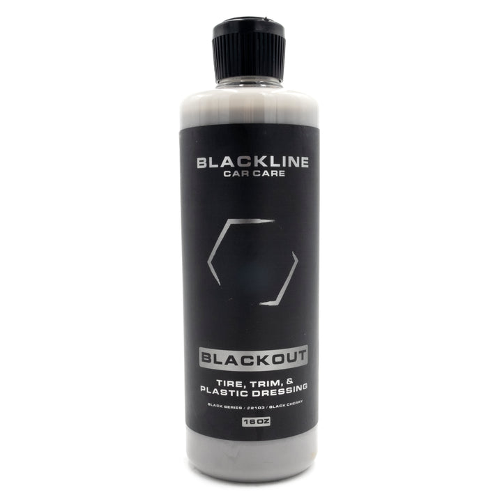 Blackline Blackout Tire, Trim &amp; Plastic Dressing in a 16 oz bottle, enhances vehicle appearance with a sleek black finish.