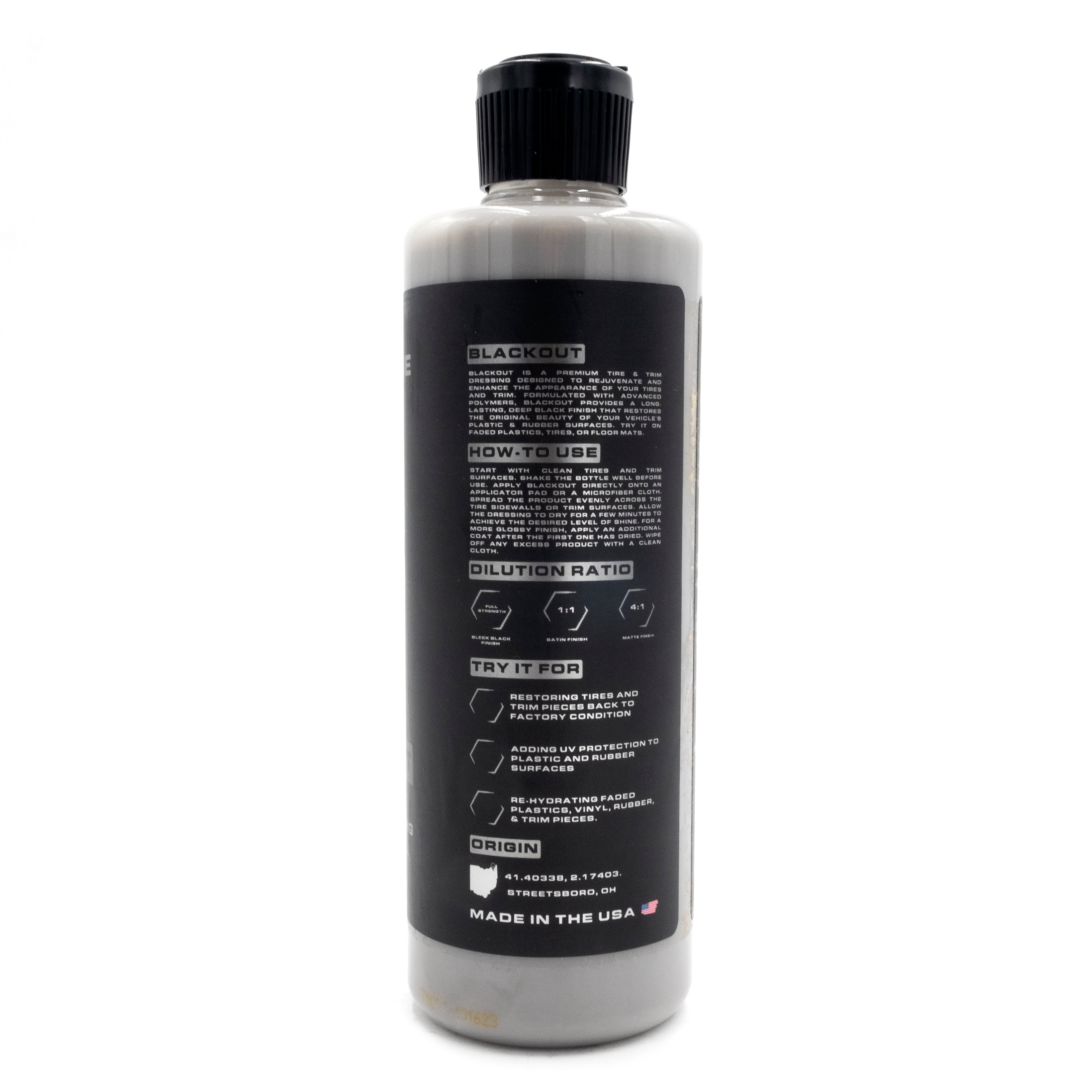 Blackline Blackout Trim & Tire Dressing bottle with black label, instructions, dilution ratios, and origin details.