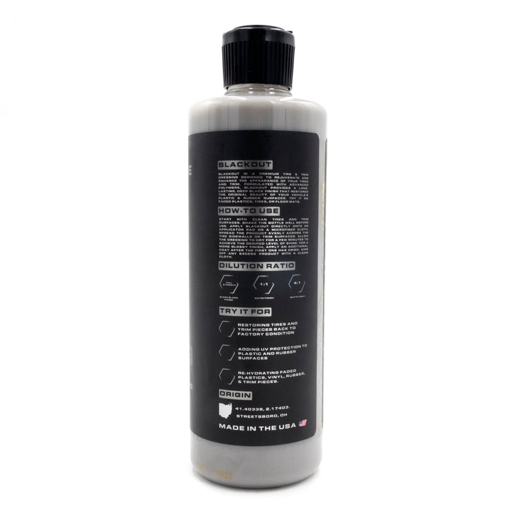 Blackline Blackout Trim &amp; Tire Dressing bottle with black label, instructions, dilution ratios, and origin details.