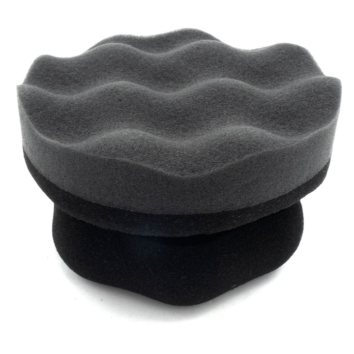 Hex applicator pad designed for even application of wax or polish on boats, featuring a textured surface for optimal results.