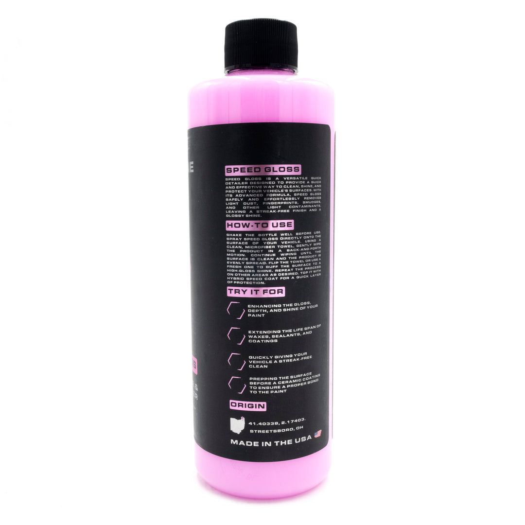 Blackline Speed Gloss Quick Detailer bottle with black label, pink cap, and product instructions for fast vehicle gloss enhancement.