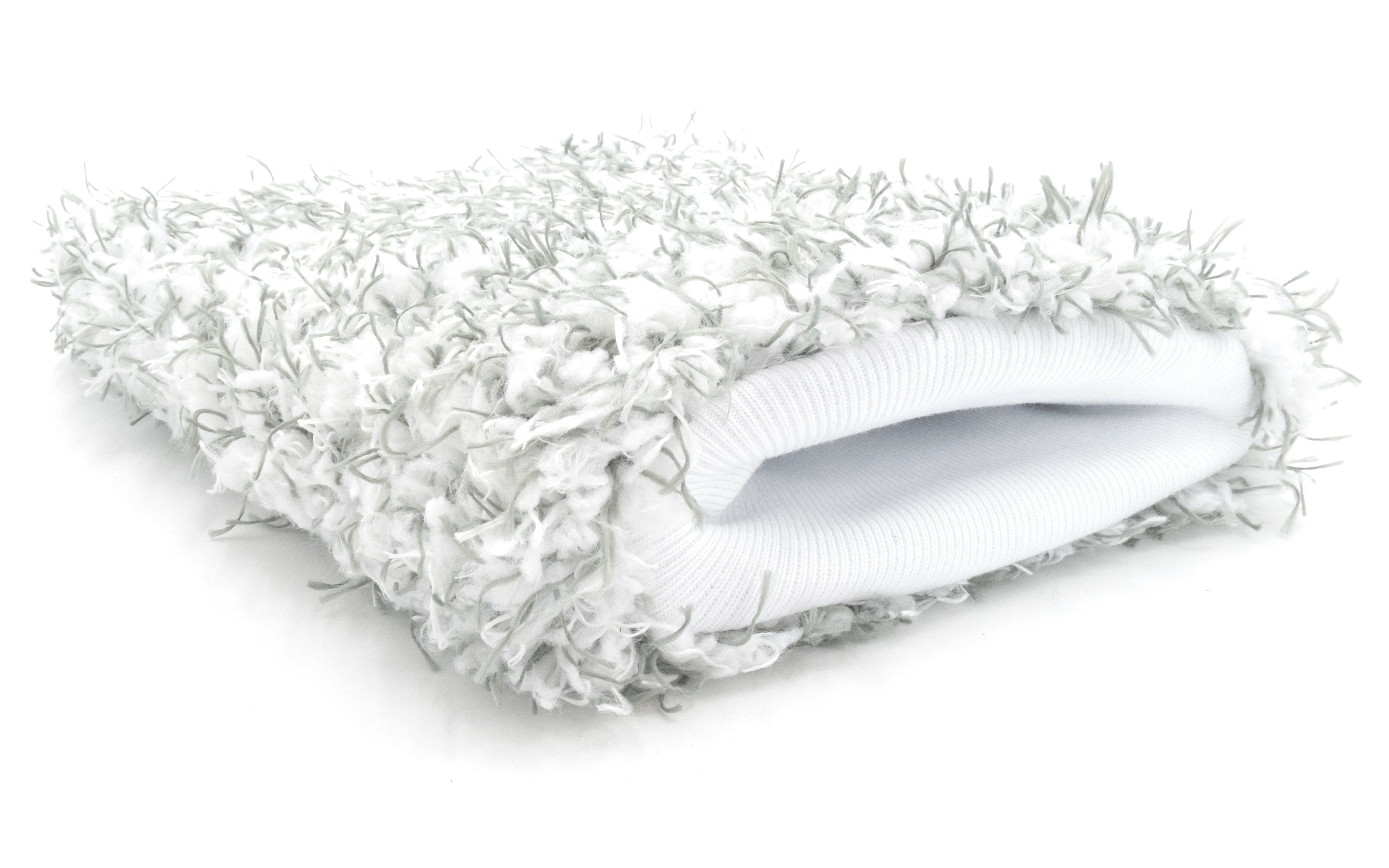 White microfiber wash mitt with soft, textured surface and plush, shaggy exterior for gentle car cleaning.