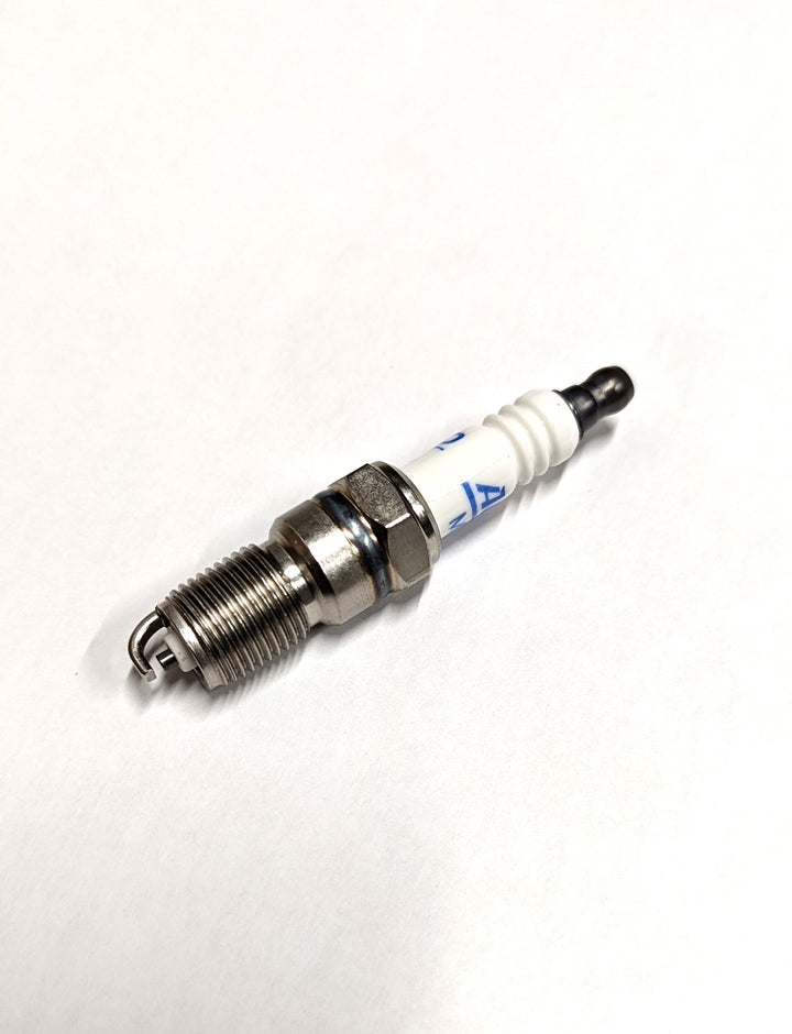 Indmar 5.7L Vortec spark plug designed for optimal performance in marine engines, ensuring reliable ignition and efficiency.
