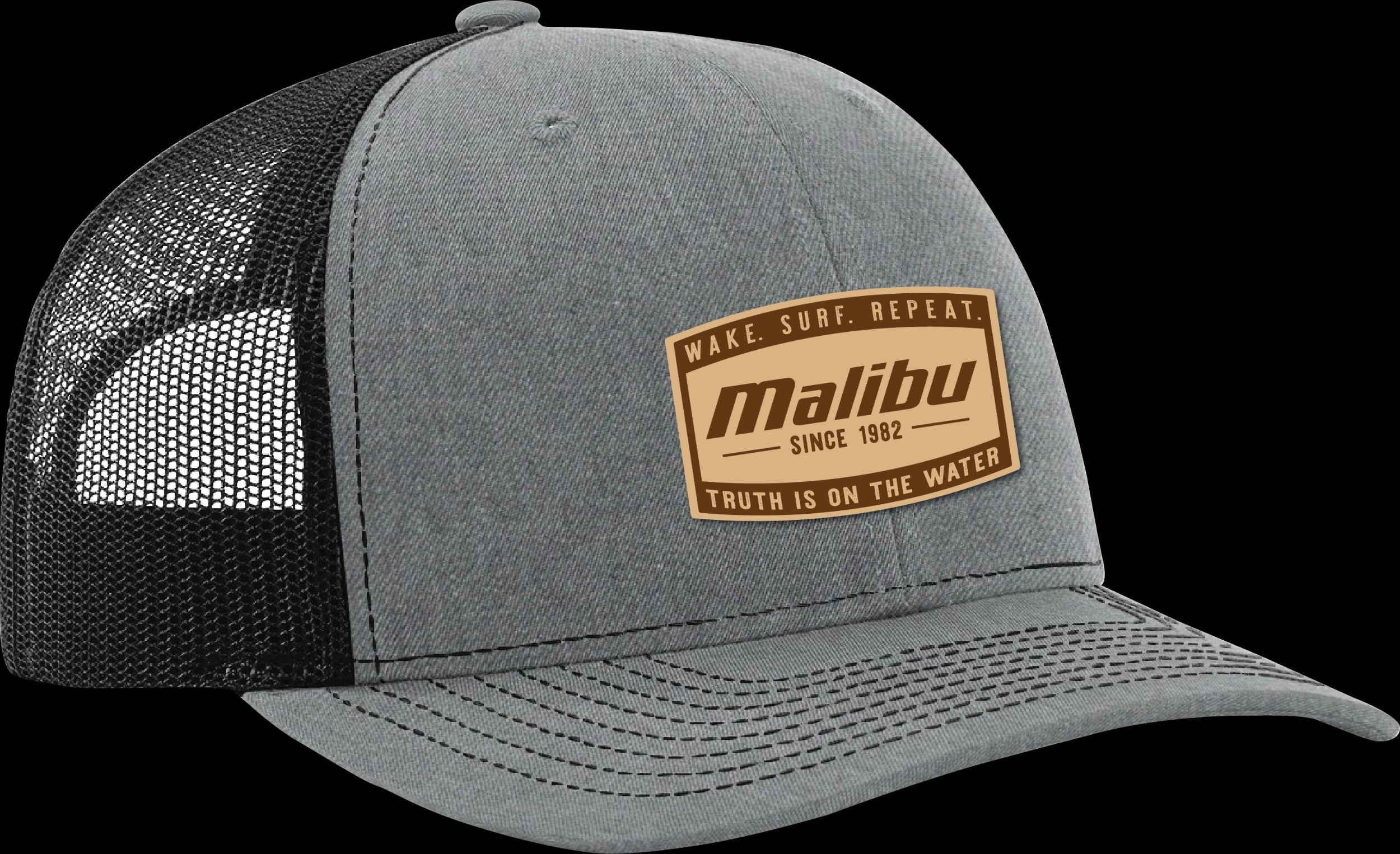 Gray trucker hat with a brown Malibu patch featuring the slogan "Wake. Surf. Repeat." and "Truth is on the water" on a black background.