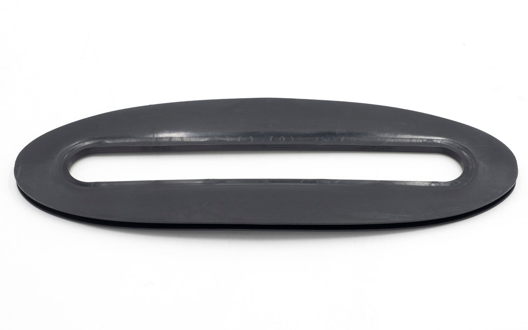 Rubber cleat pocket for outer armor, oval-shaped with a hollow center, black, designed to hold cleats securely.