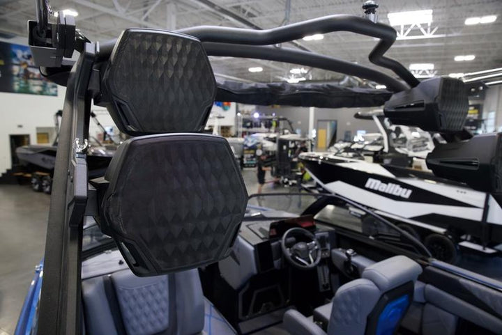 REV12 Tower Speakers with RGB lighting mounted on a boat tower, enhancing audio experience and aesthetics.