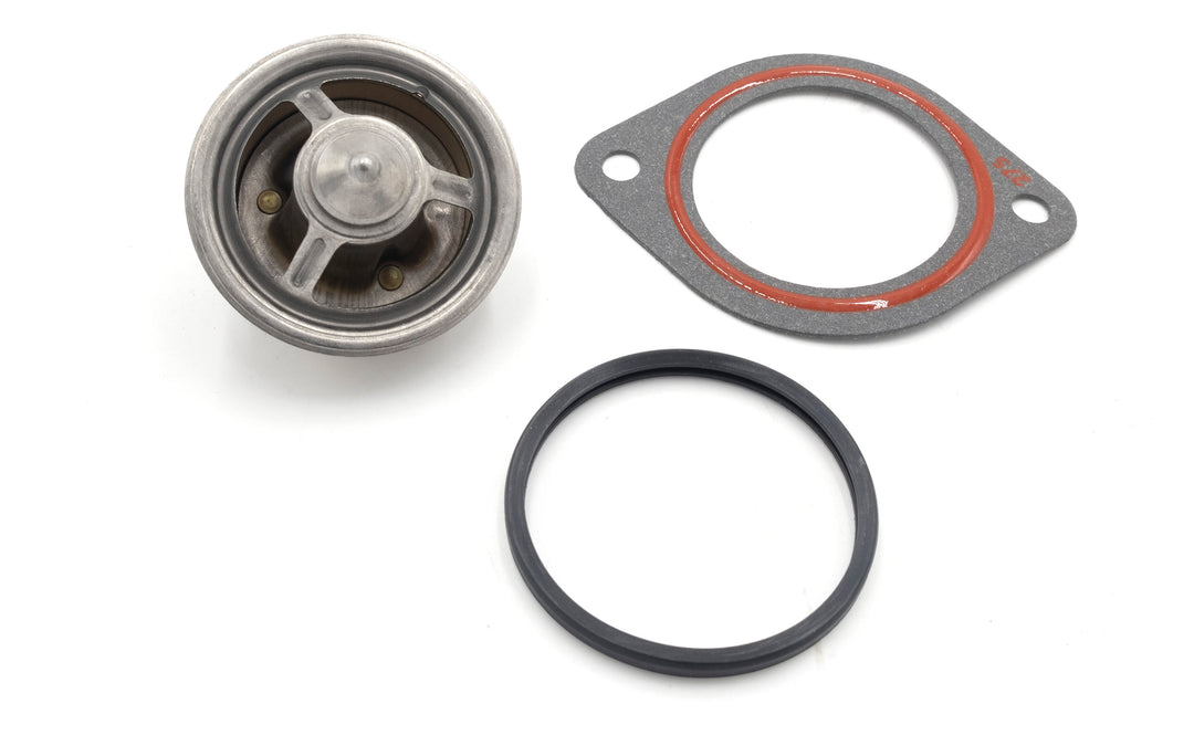 Replacement PCM thermostat kit with gasket and O-ring for H5/H6 &amp; ZR4 models, featuring metal components and sealing parts.
