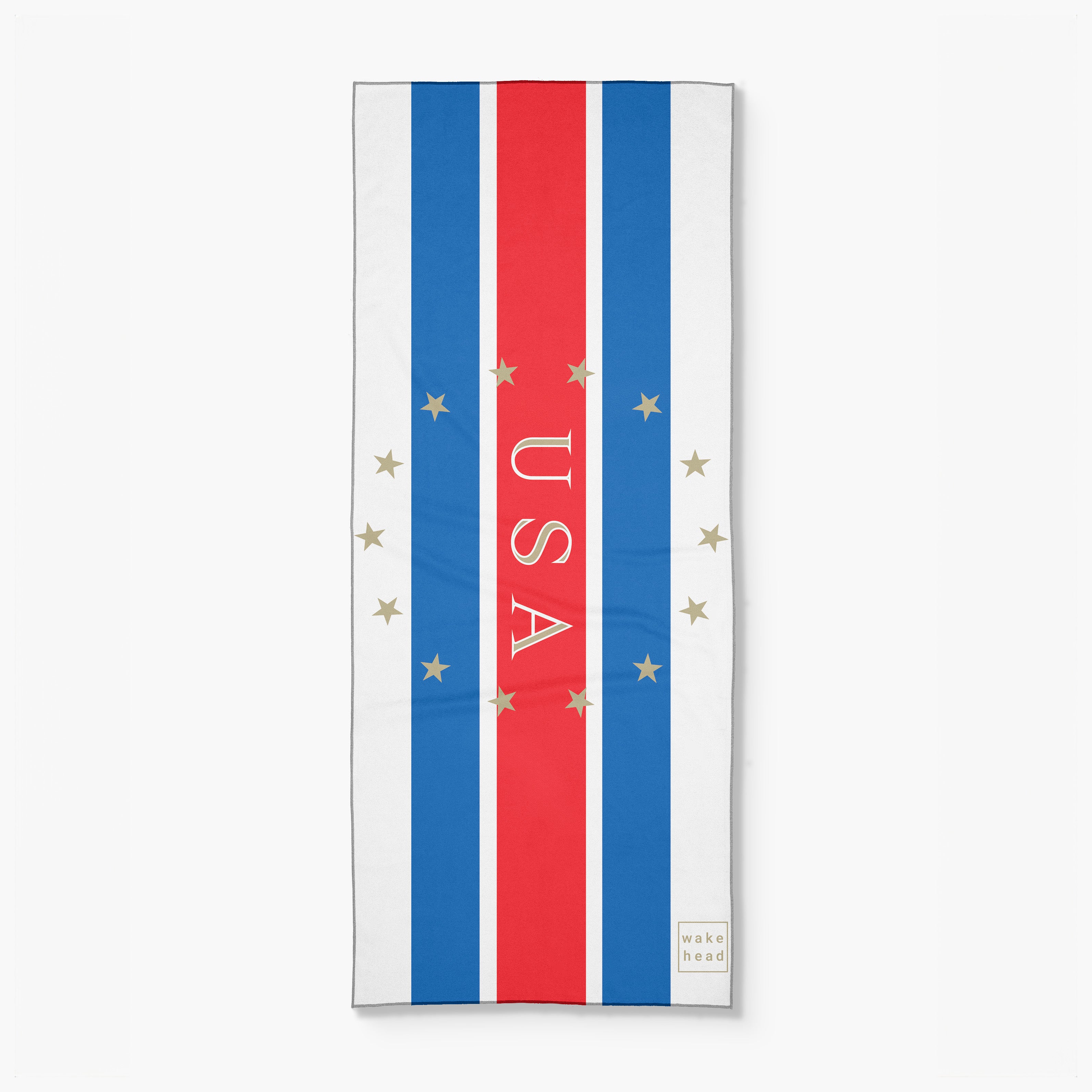 Stars and stripes lake towel with red, white, and blue vertical stripes, gold stars, and "USA" text in the center.