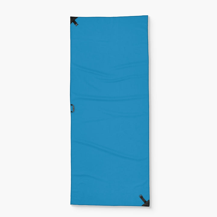 Blue Tower Towel with black corner reinforcements, designed for easy storage and portability.