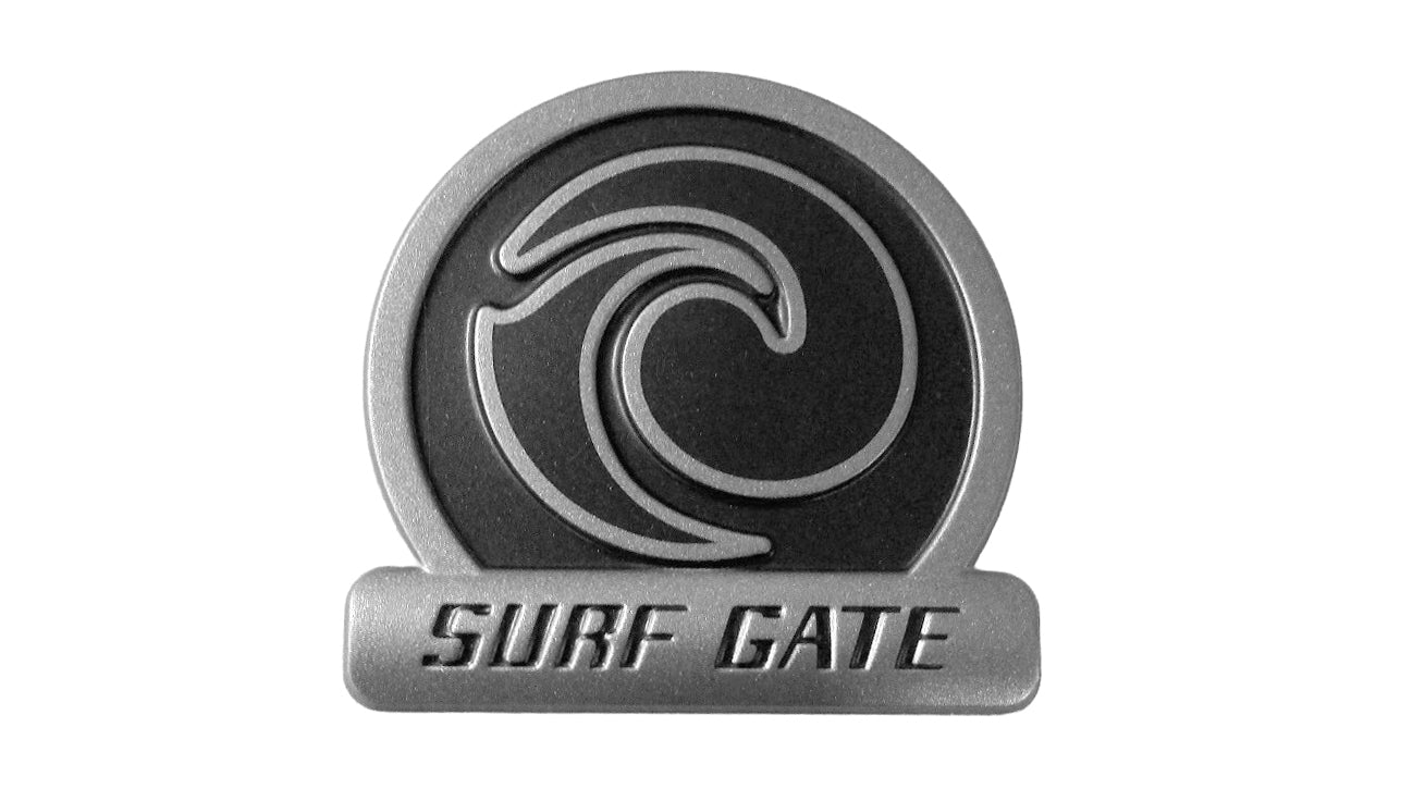Surf Gate Emblem featuring a wave design, ideal for enhancing the look of your Malibu or Axis boat.