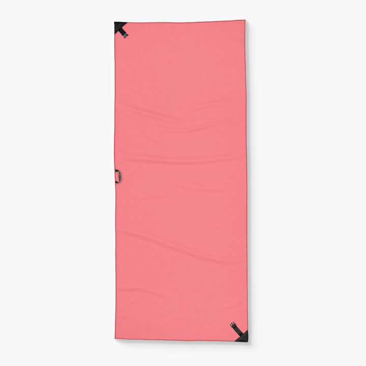 Pink Tower Towel with black corner loops and a side handle, designed for gym or outdoor use.