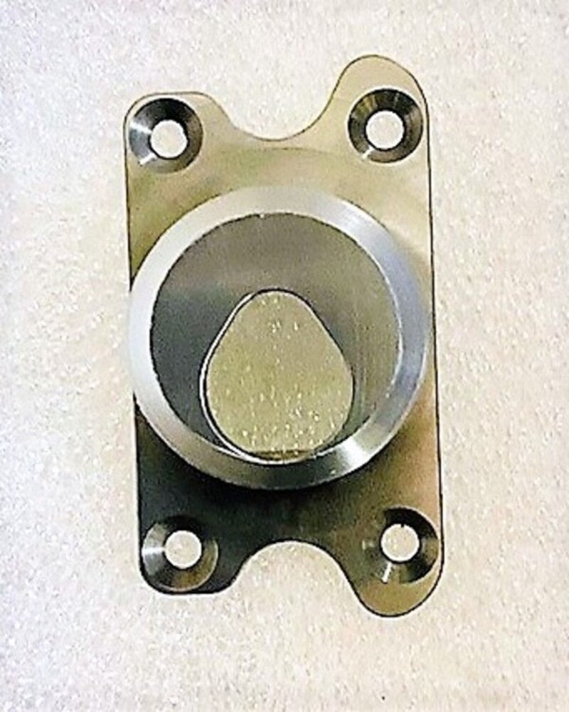 Metal backing plate for transom camera housing, with four mounting holes and central circular opening.