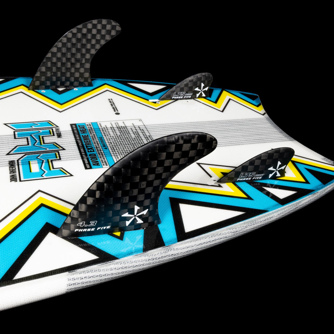 2026 Phase Five Ahi surfboard featuring a vibrant design with three fins and a textured surface for enhanced performance.