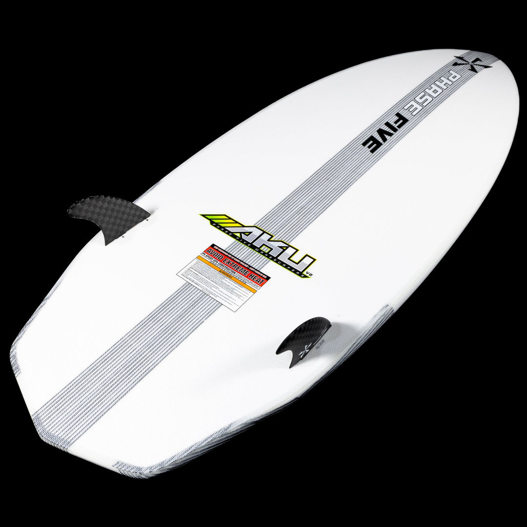 2026 Phase Five Aku V2 surfboard featuring a sleek white design and three fins for enhanced performance on the water.