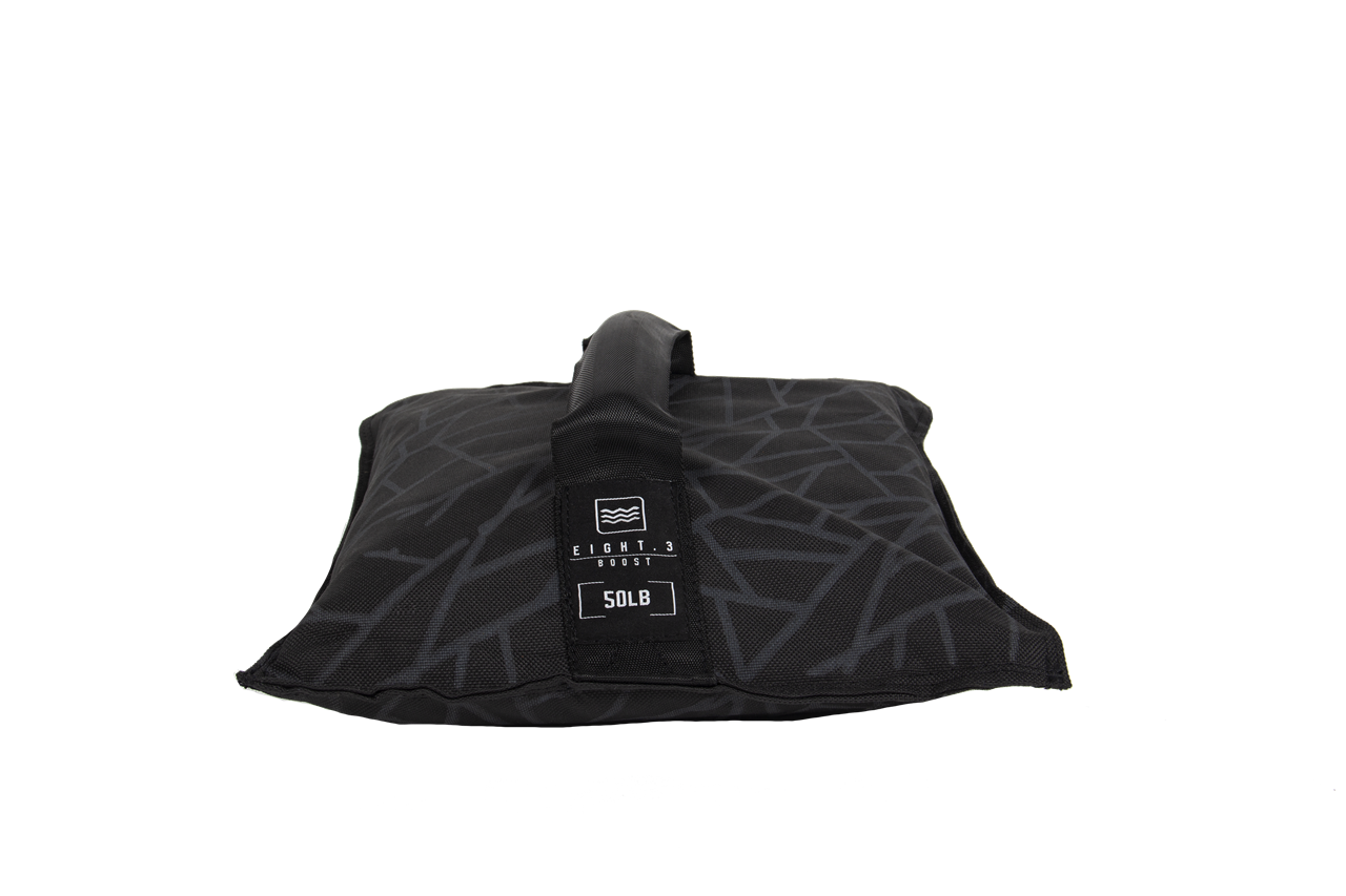 Black Eight.3 Boost sandbag with a handle, featuring a geometric pattern and 50lb weight label on a plain background.