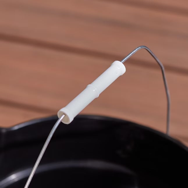 Close-up of a detailing bucket with a metal handle and white plastic grip, used for car cleaning and detailing.